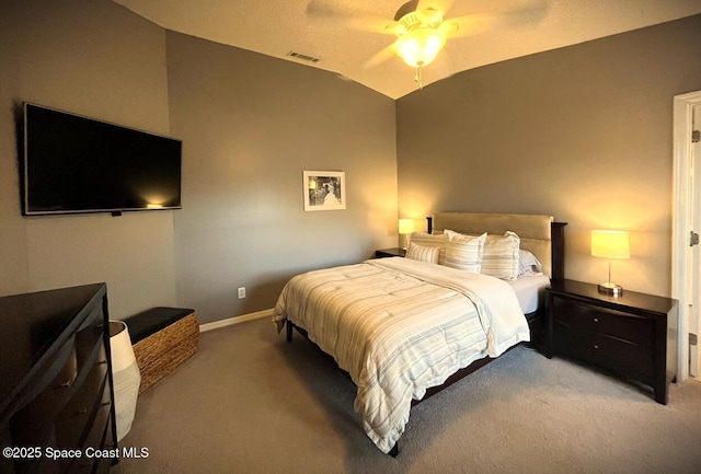 bedroom featuring vaulted ceiling, carpet, and ceiling fan