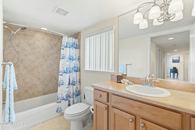 full bathroom featuring shower / bath combo with shower curtain, tile patterned floors, vanity, and toilet