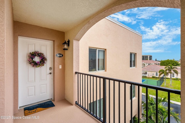 doorway to property with a balcony