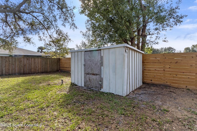 view of outdoor structure with a yard