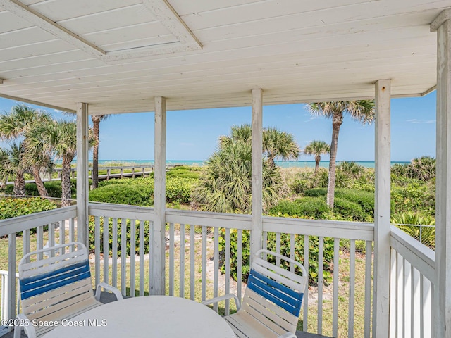 sunroom with a water view