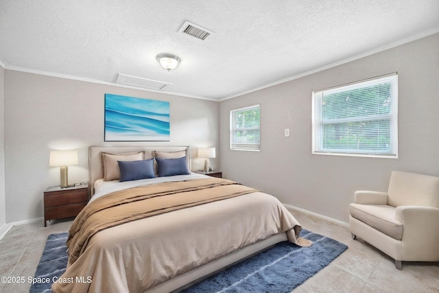 bedroom featuring crown molding