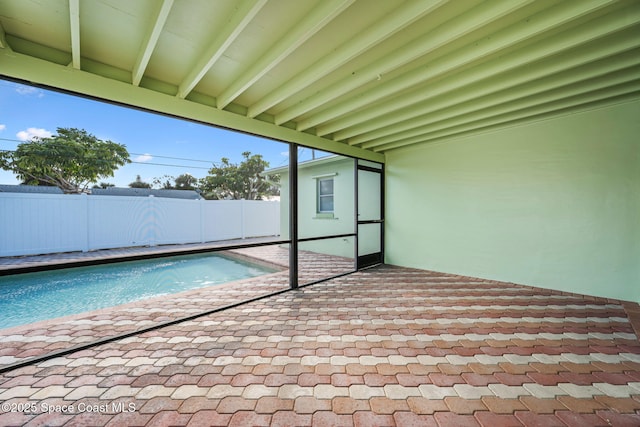 view of swimming pool featuring a patio area