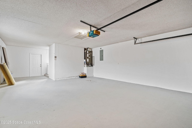 garage featuring electric panel and a garage door opener