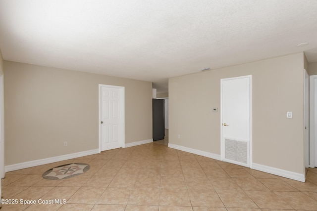 view of tiled empty room