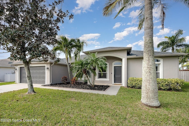 view of front of property with a garage, cooling unit, and a front lawn