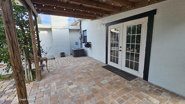 view of patio / terrace with cooling unit and french doors