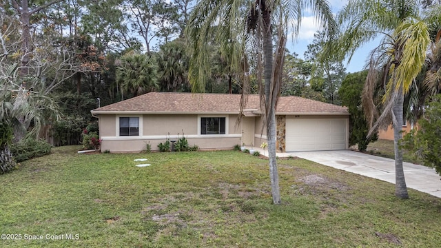 ranch-style home with a garage and a front lawn