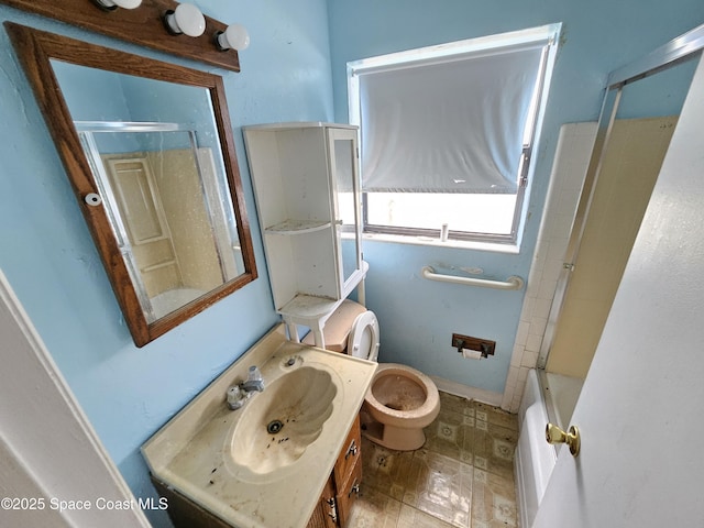 bathroom with shower / bathtub combination, vanity, and toilet