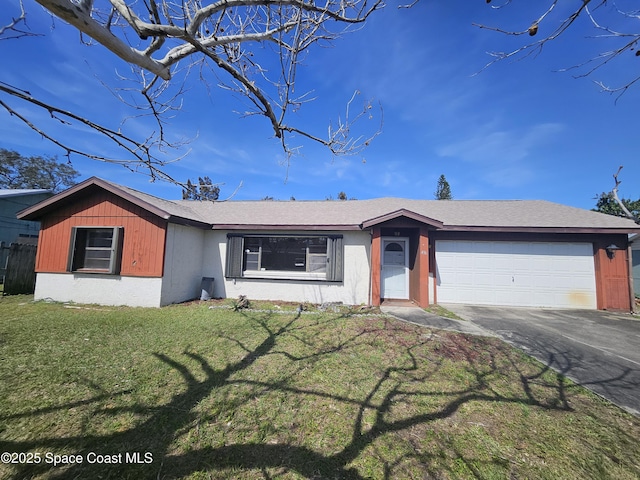 ranch-style house with driveway, a garage, and a front lawn