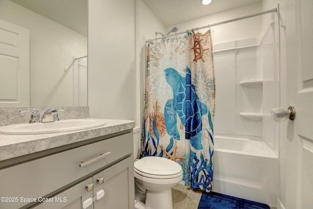 full bathroom with toilet, shower / bath combination with curtain, and vanity