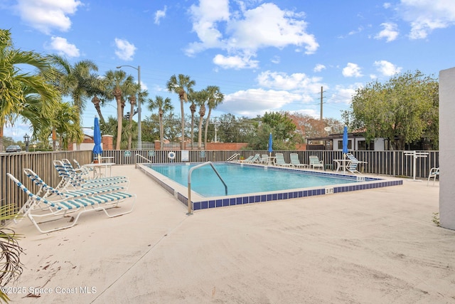 view of pool featuring a patio area