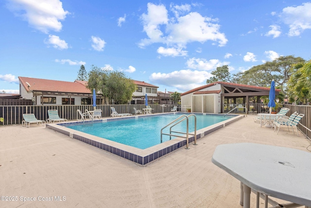 view of pool featuring a gazebo and a patio