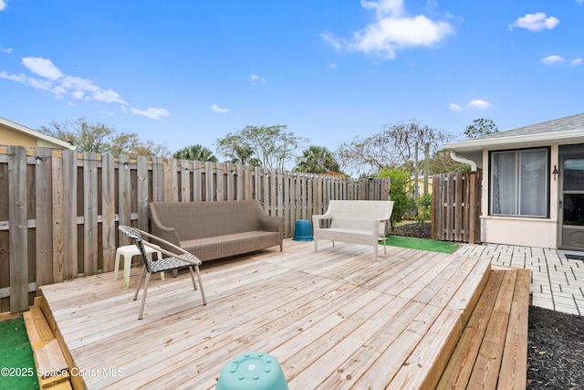 deck with an outdoor hangout area