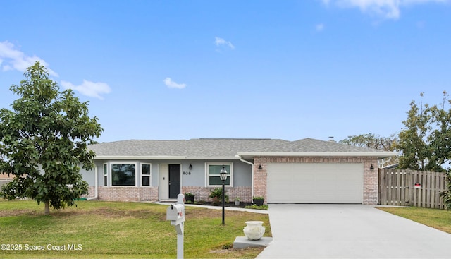 single story home with a garage and a front lawn