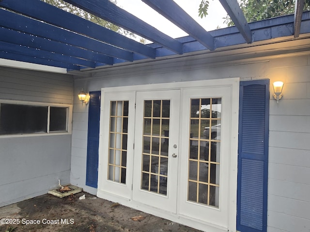 entrance to property featuring french doors