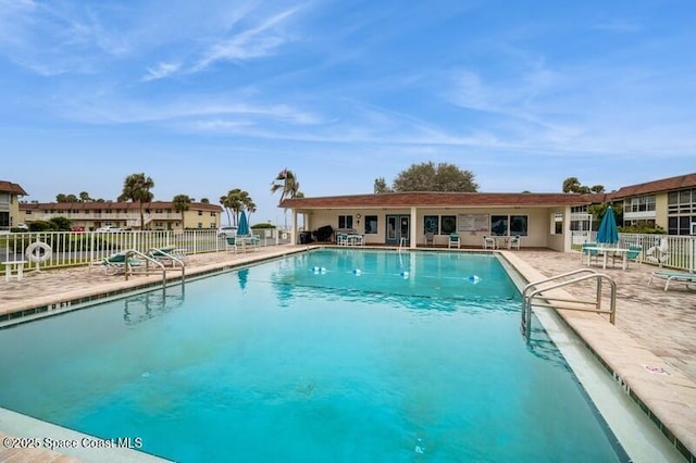 view of swimming pool featuring a patio