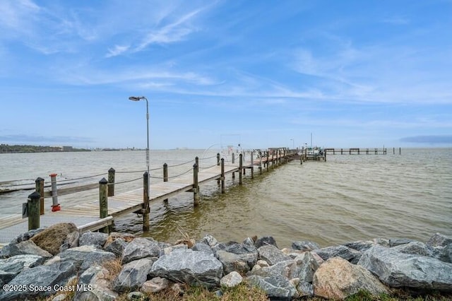 view of dock with a water view