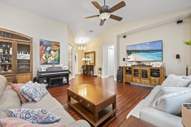 living room featuring vaulted ceiling, dark hardwood / wood-style floors, and ceiling fan with notable chandelier