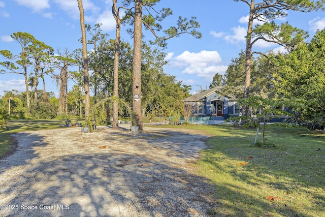 exterior space with a front yard