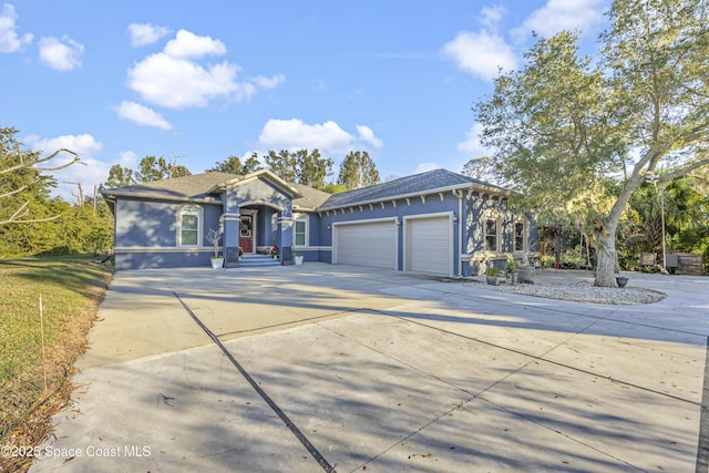 view of front of property with a garage