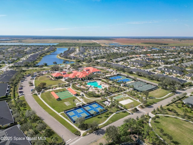 bird's eye view with a water view