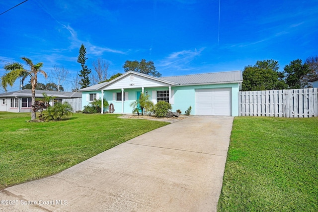 single story home featuring a garage, covered porch, and a front lawn