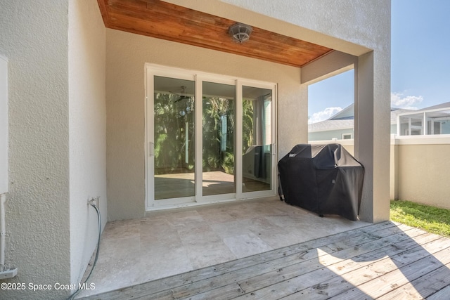 view of patio / terrace with a grill and a deck