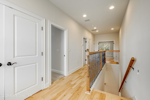 hallway featuring hardwood / wood-style floors