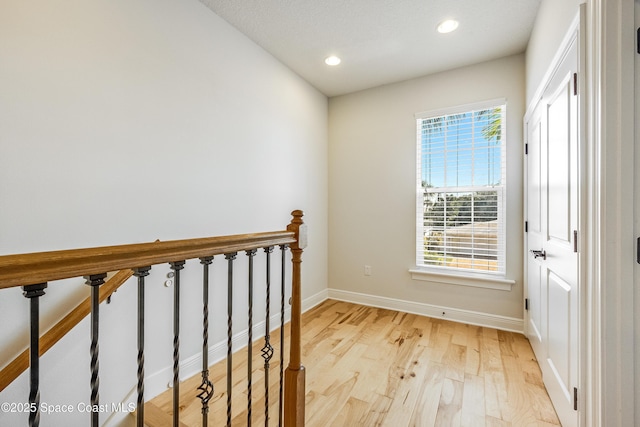 hallway featuring light hardwood / wood-style flooring