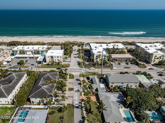 aerial view featuring a water view and a view of the beach