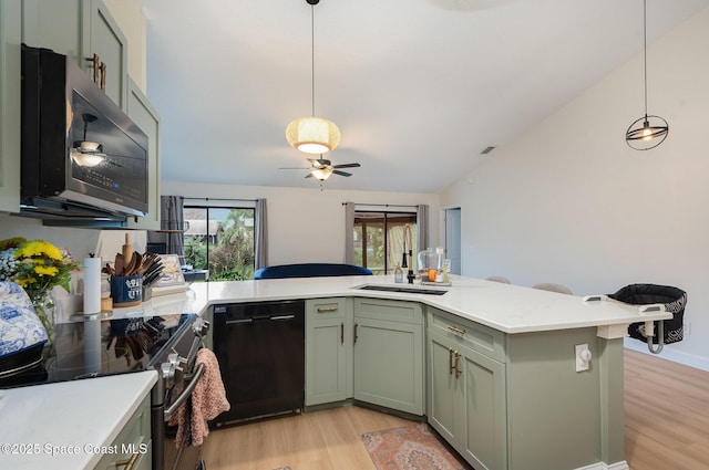 kitchen with decorative light fixtures, black dishwasher, green cabinets, kitchen peninsula, and stainless steel electric stove