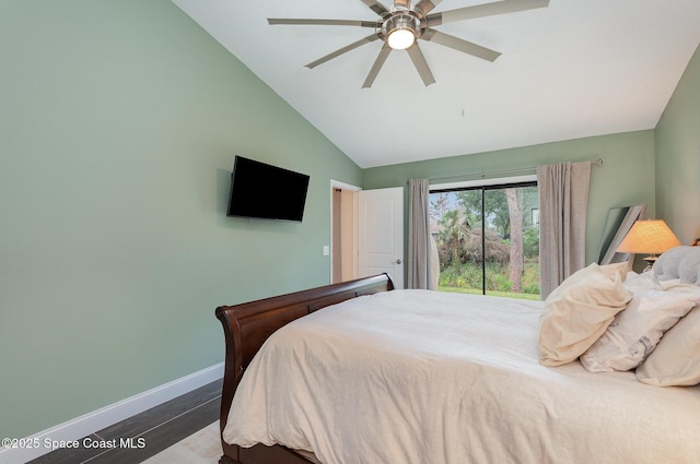 bedroom with ceiling fan, wood-type flooring, and lofted ceiling