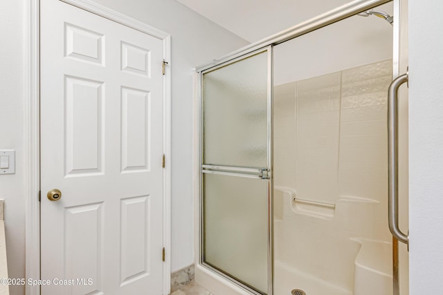 bathroom with walk in shower