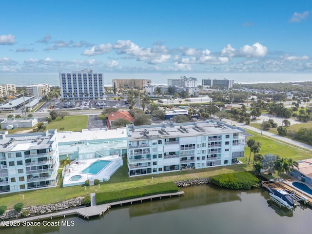 drone / aerial view with a water view