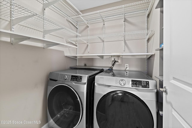 laundry room featuring washer and dryer