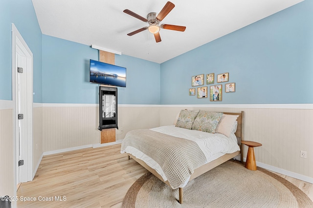 bedroom featuring ceiling fan and wood-type flooring