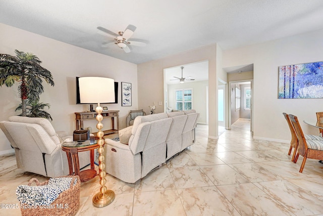 living room featuring ceiling fan