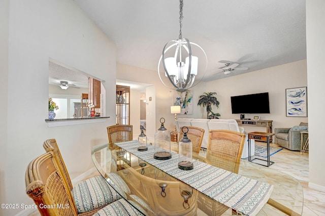 dining space featuring ceiling fan with notable chandelier and a textured ceiling