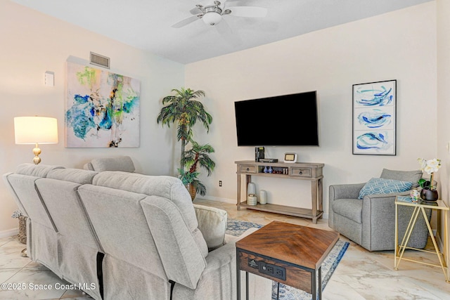 living room with ceiling fan