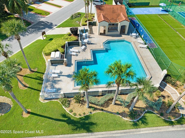 view of swimming pool featuring a patio