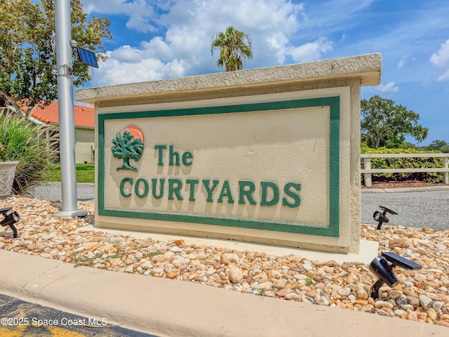 view of community sign