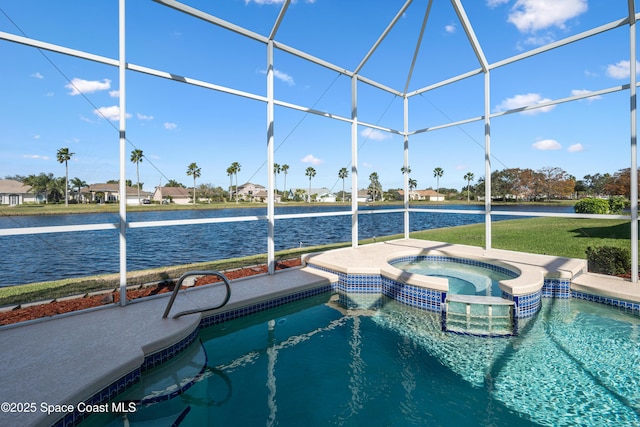 view of swimming pool featuring a lanai, a water view, and an in ground hot tub