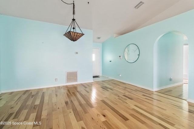 unfurnished living room featuring light wood-type flooring