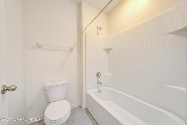 bathroom featuring tile patterned floors, bathtub / shower combination, and toilet