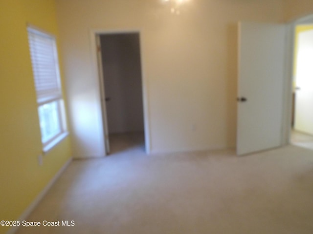 unfurnished room featuring a wealth of natural light