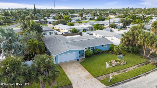 birds eye view of property with a residential view