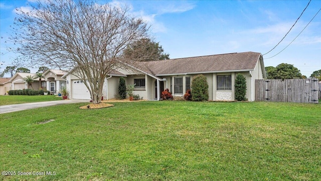 single story home with a garage and a front lawn