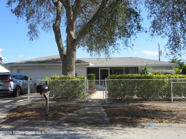 single story home with a garage