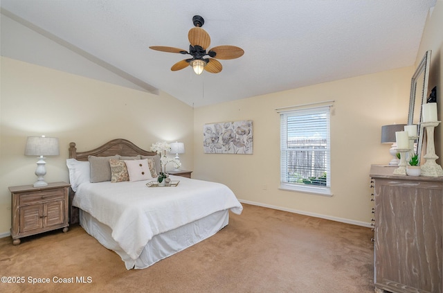 carpeted bedroom with lofted ceiling and ceiling fan